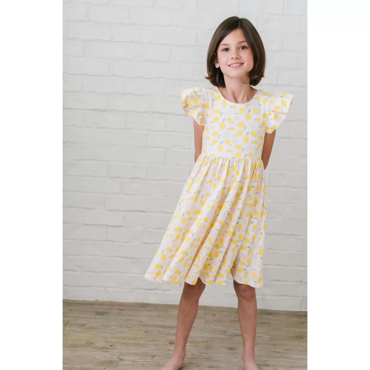 olivia dress in lemon drop  pocket twirl dress