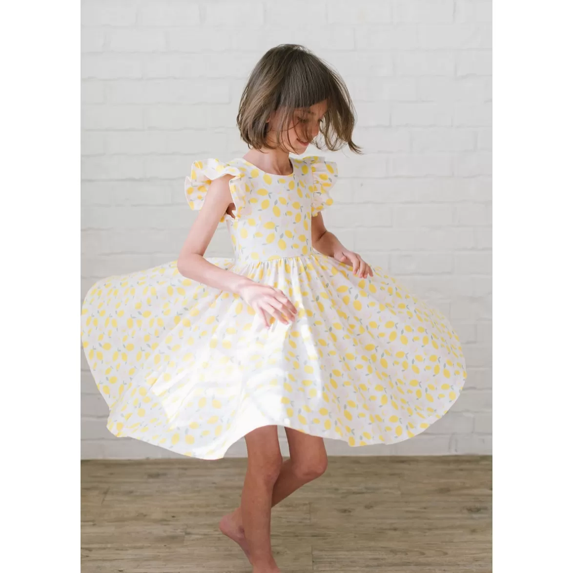 olivia dress in lemon drop  pocket twirl dress