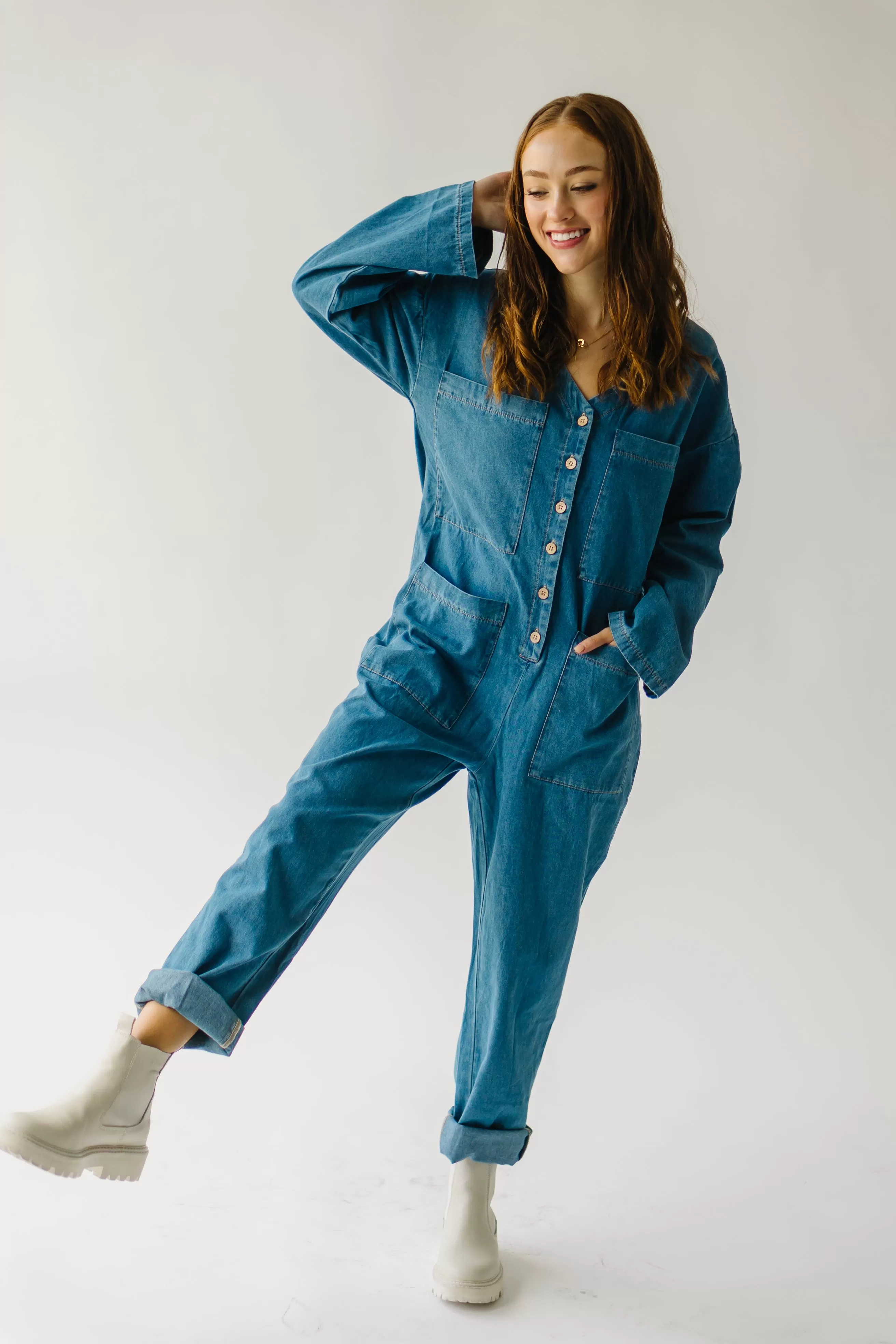 The Adeline Button-Down Jumpsuit in Washed Denim